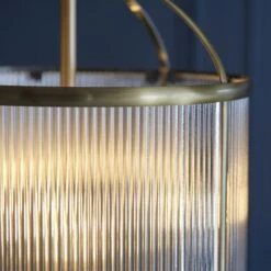 Leonard Ribbed Glass Four Light Pendant In Antique Brass 5 Leonard Ribbed Glass Four Light Pendant In Antique Brass -Perch & Parrow Home Sales Store en24040191 l2